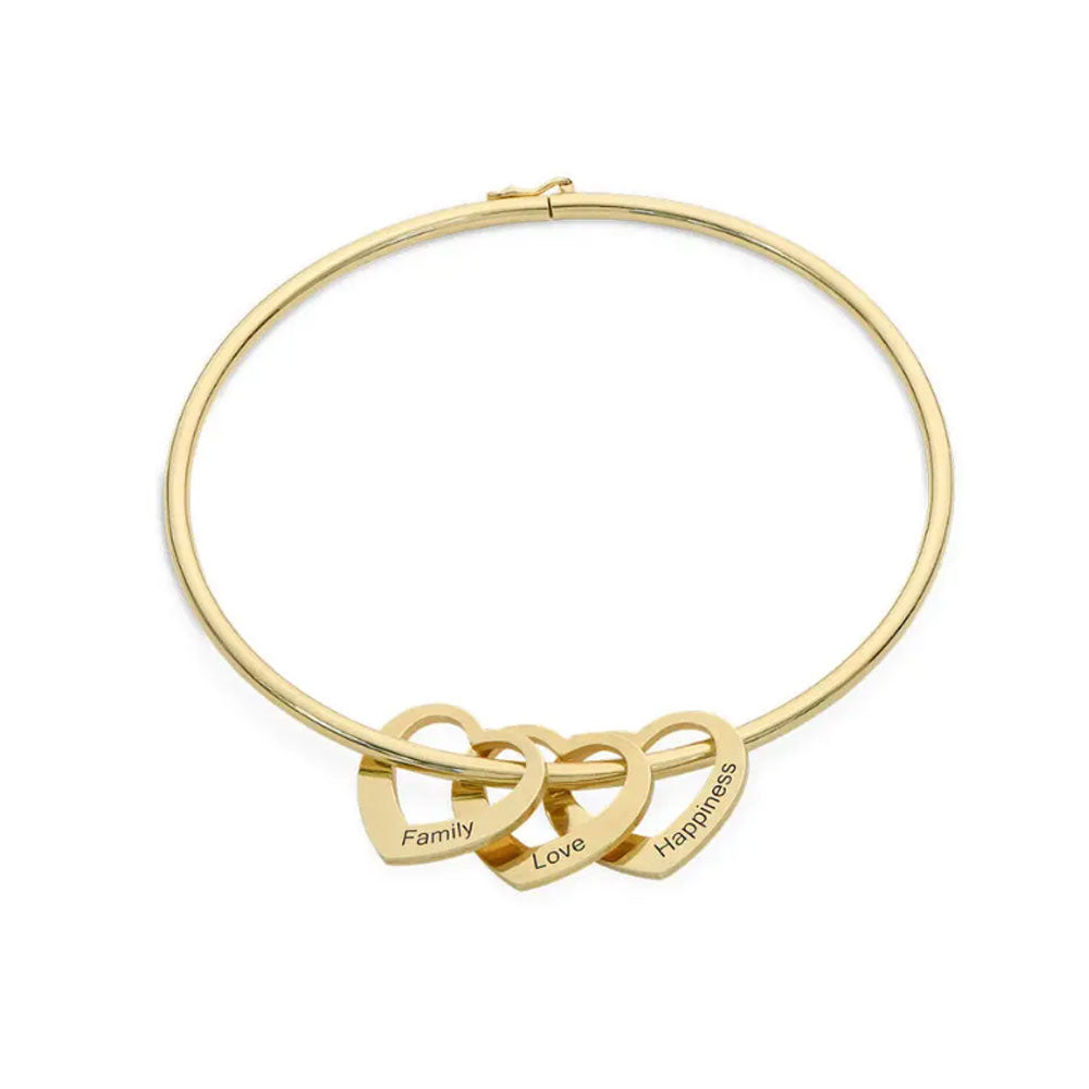 Bangle Bracelet with Heart Pendants in Gold