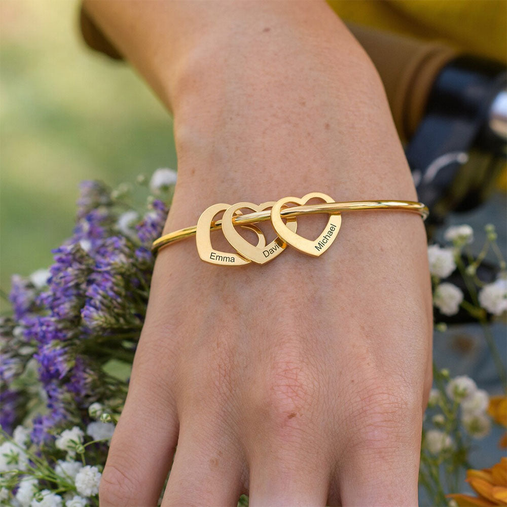 Bangle Bracelet with Heart Pendants in Gold