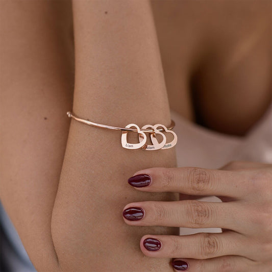 Bangle Bracelet with Heart Pendants in Rose Gold