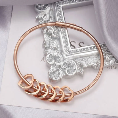 Bangle Bracelet with Heart Pendants in Rose Gold